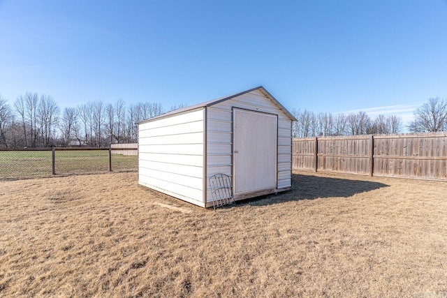 view of outdoor structure featuring a lawn