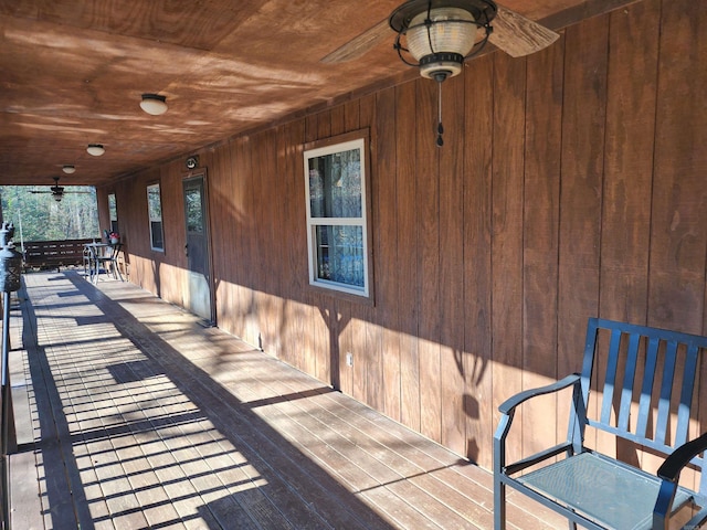 wooden deck with ceiling fan