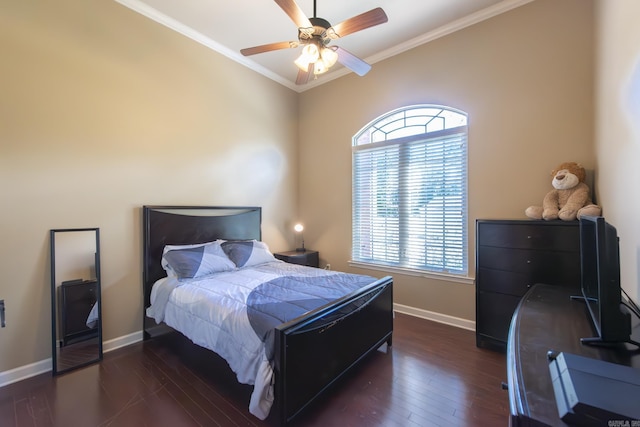 bedroom with ceiling fan, dark hardwood / wood-style floors, ornamental molding, and multiple windows