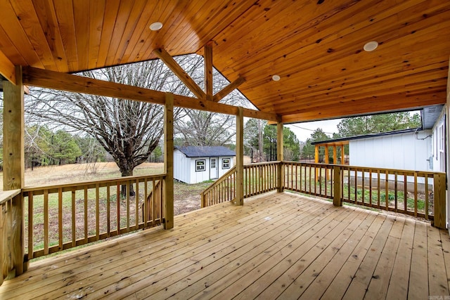 deck with an outdoor structure