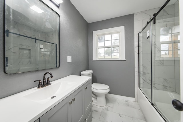 full bathroom with vanity, toilet, and combined bath / shower with glass door