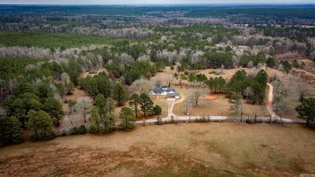 birds eye view of property with a rural view