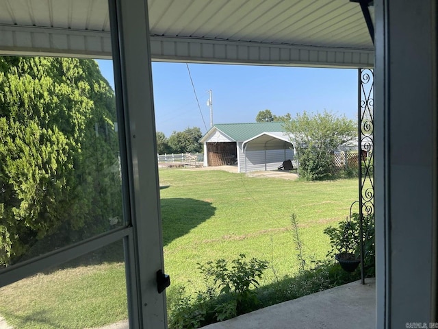 view of yard with a carport