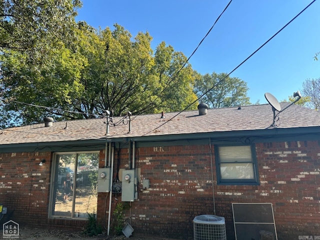 back of house with cooling unit