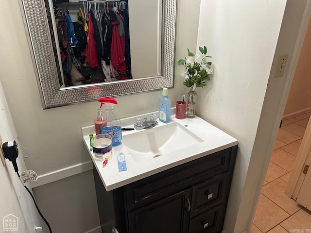 bathroom featuring tile patterned floors and vanity