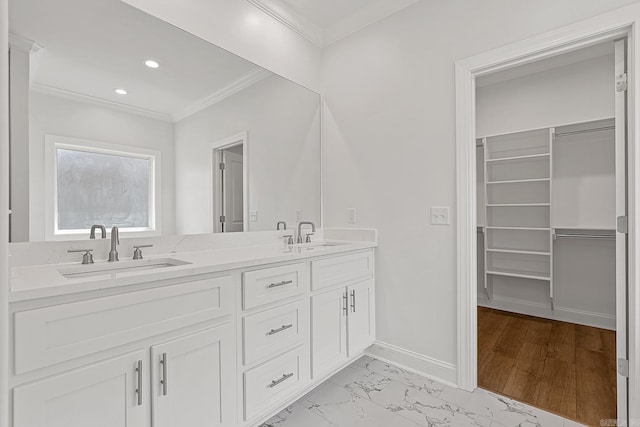 bathroom with vanity and ornamental molding