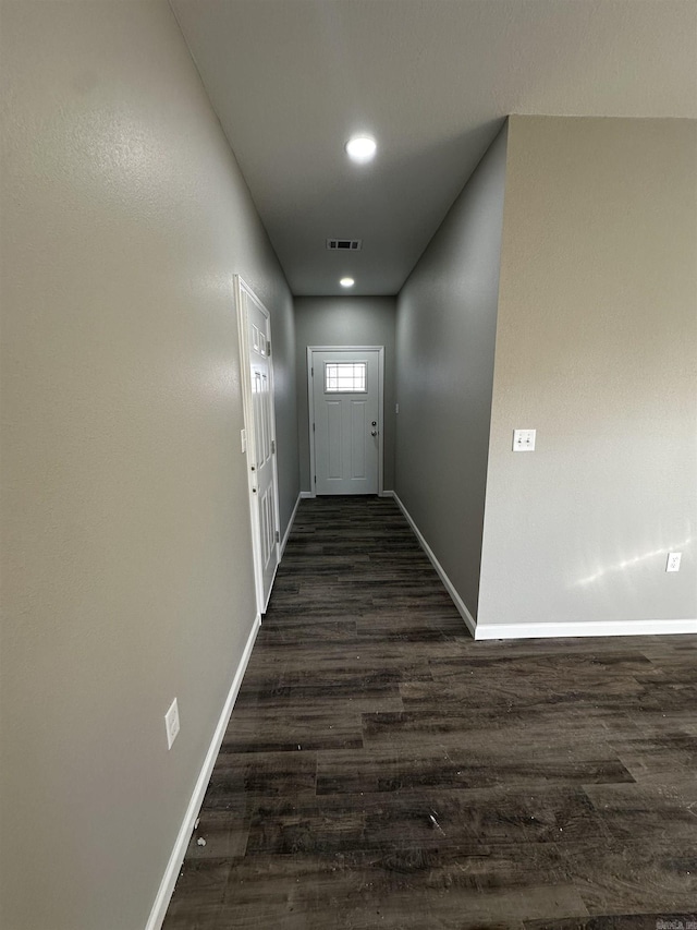 doorway featuring dark hardwood / wood-style flooring