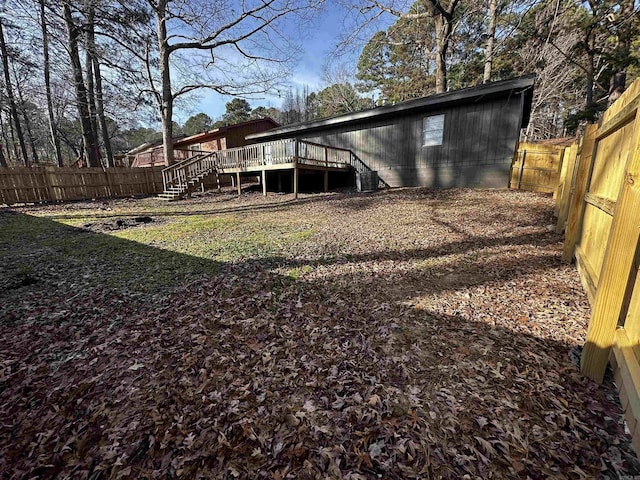 view of yard with a deck