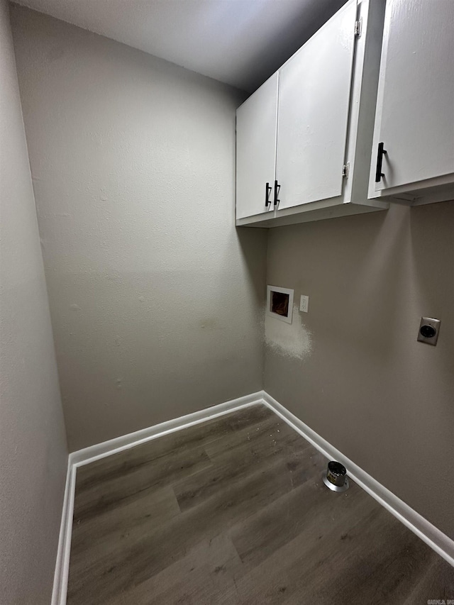 laundry area featuring cabinets, wood-type flooring, hookup for a washing machine, and hookup for an electric dryer