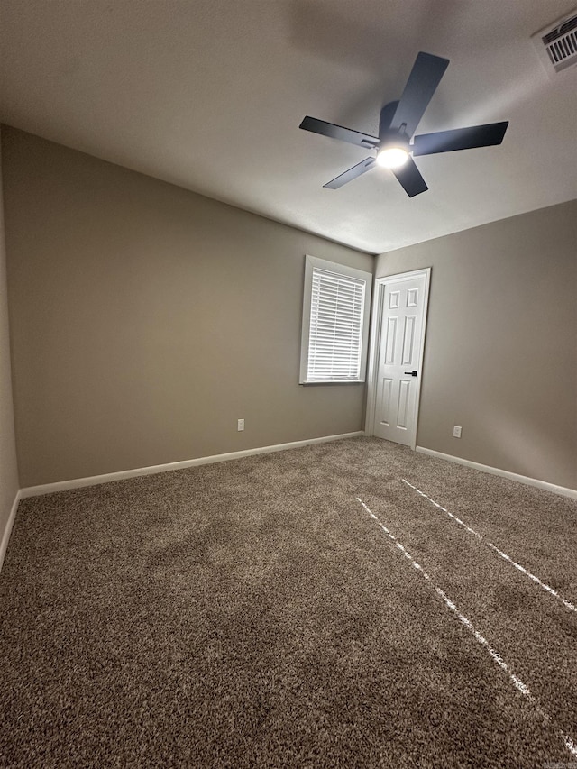 unfurnished bedroom featuring carpet floors and ceiling fan