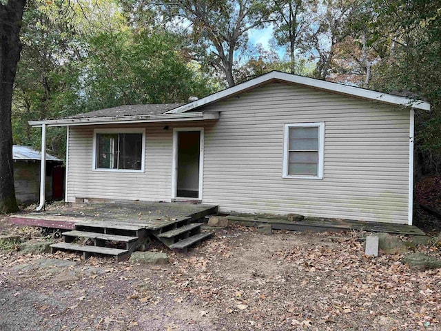 view of front of house featuring a wooden deck