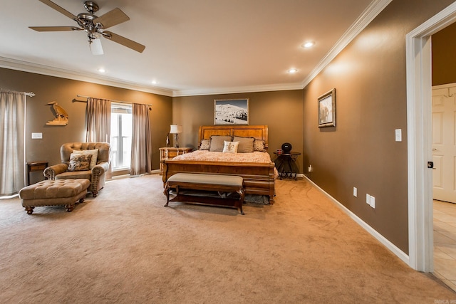 carpeted bedroom with ceiling fan and ornamental molding