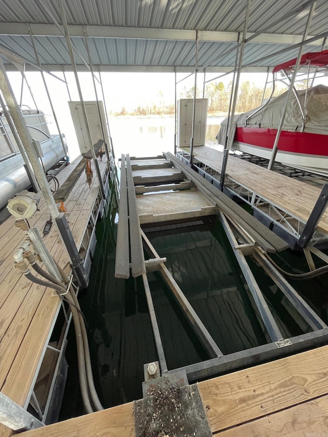 dock area featuring a water view