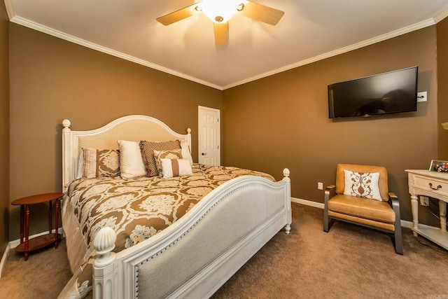 carpeted bedroom with ceiling fan and ornamental molding