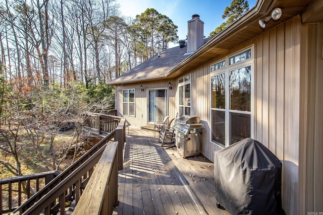 wooden deck with area for grilling