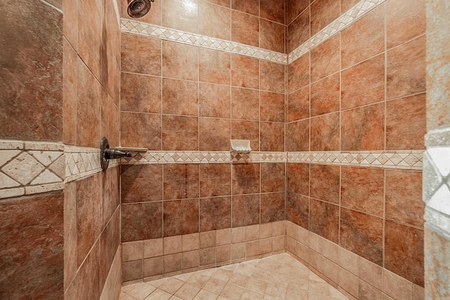 details with a tile shower