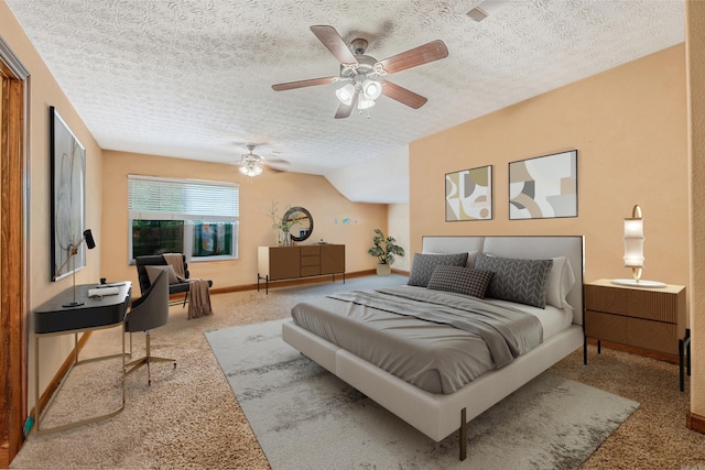 carpeted bedroom featuring ceiling fan, lofted ceiling, and a textured ceiling