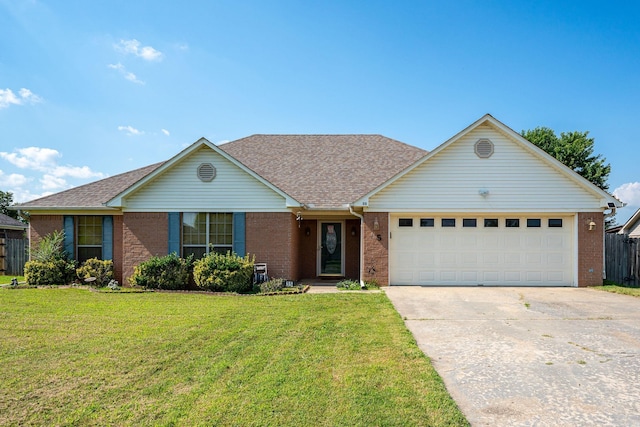 single story home featuring a front yard and a garage