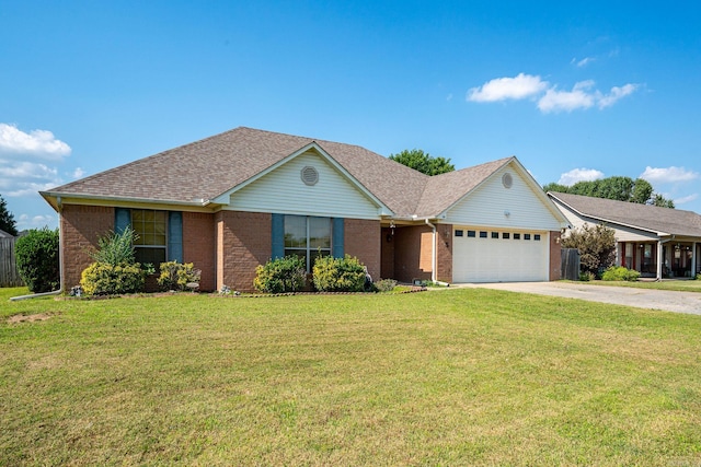 ranch-style home featuring a garage and a front lawn