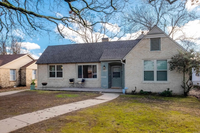 view of front of home with a front yard