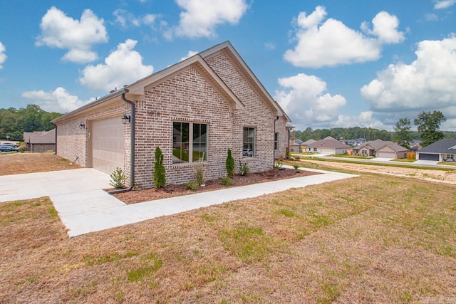 view of property exterior with a lawn and a garage