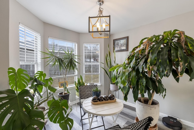 living area featuring an inviting chandelier