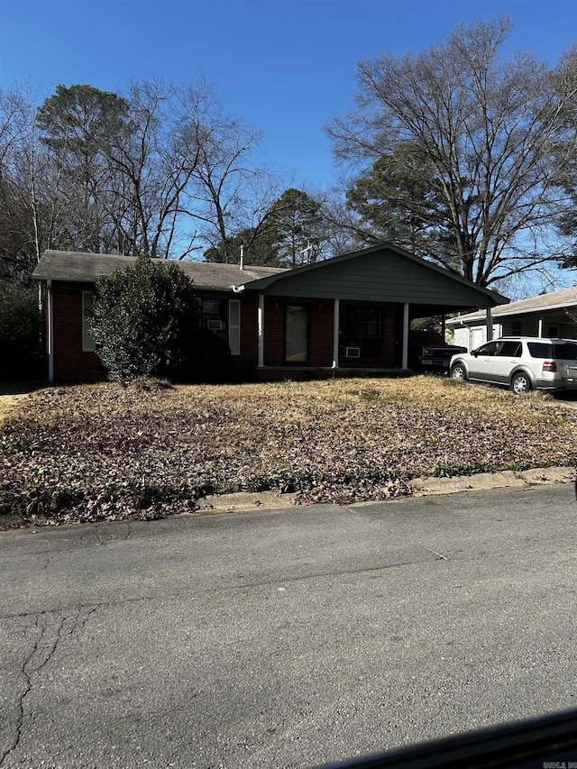 view of front of house with a carport