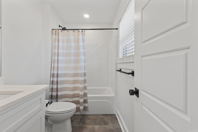 full bathroom with shower / bath combination with curtain, vanity, and toilet