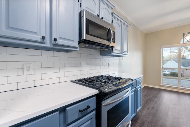 kitchen featuring light stone countertops, backsplash, stainless steel appliances, dark wood-type flooring, and crown molding