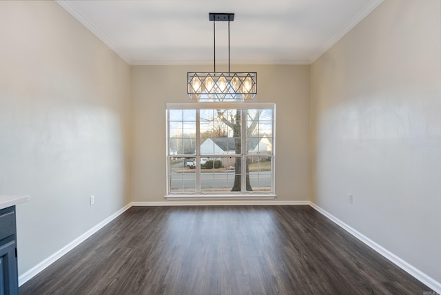 unfurnished dining area with dark hardwood / wood-style floors and ornamental molding