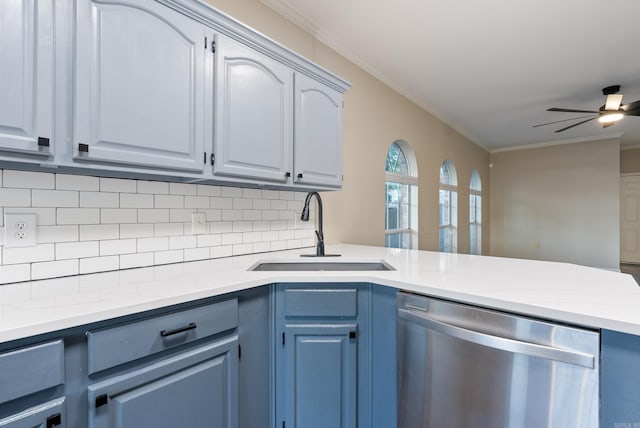 kitchen featuring tasteful backsplash, stainless steel dishwasher, ceiling fan, crown molding, and sink