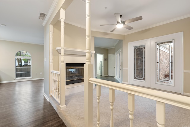 interior space featuring dark hardwood / wood-style flooring and crown molding