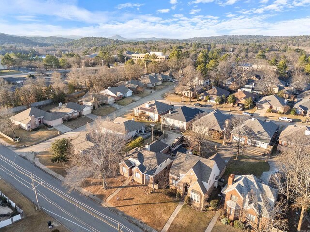 birds eye view of property with a mountain view