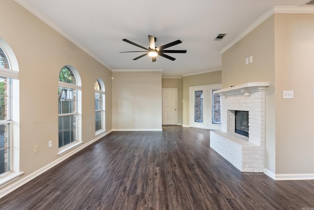 unfurnished living room featuring a fireplace, dark hardwood / wood-style floors, ceiling fan, and ornamental molding