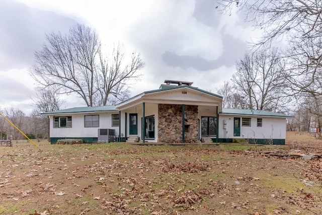 view of front of home featuring central AC unit