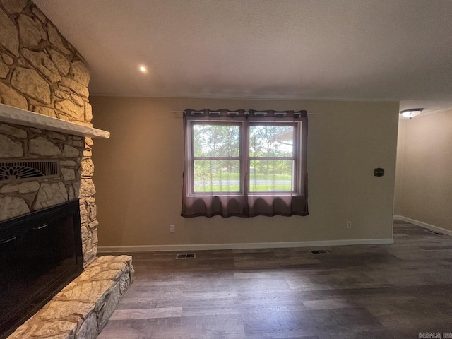 living room featuring a fireplace