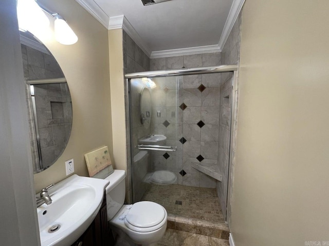 bathroom featuring toilet, ornamental molding, sink, and walk in shower