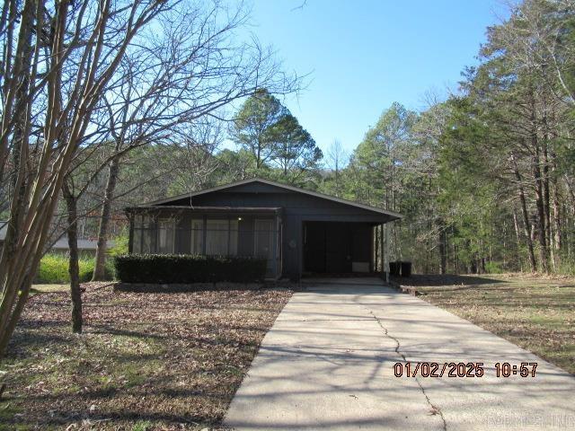 view of front of property with a carport