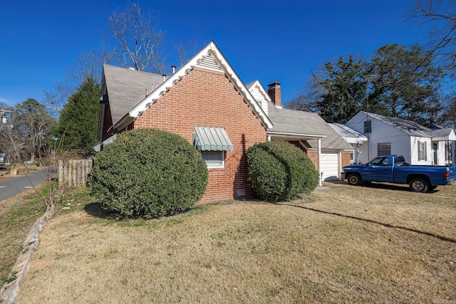 view of property exterior featuring a lawn