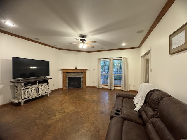 living room with ceiling fan, a fireplace, and crown molding