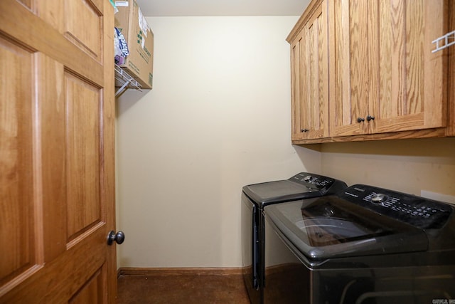 laundry area with cabinets and washer and dryer