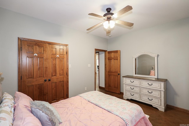 bedroom featuring ceiling fan and a closet