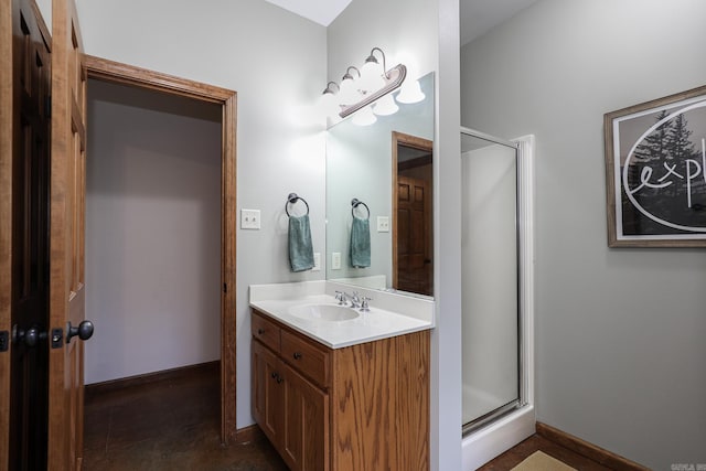 bathroom with vanity and an enclosed shower