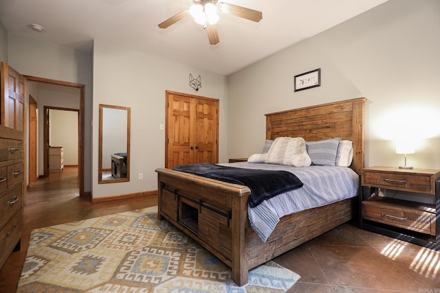 tiled bedroom with ceiling fan