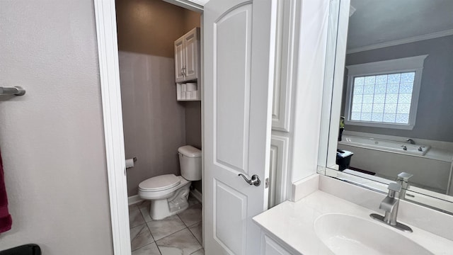 bathroom with a bath, tile patterned floors, crown molding, toilet, and vanity