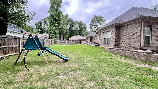 view of yard featuring a playground