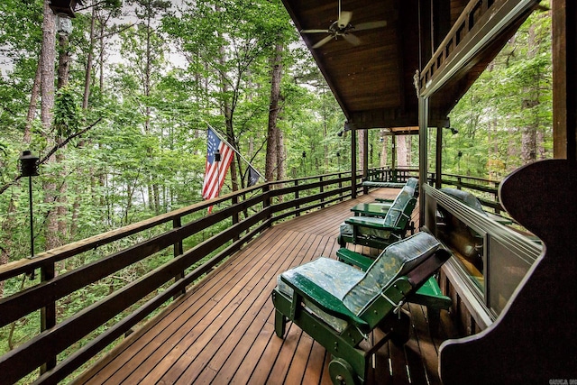 wooden deck with ceiling fan