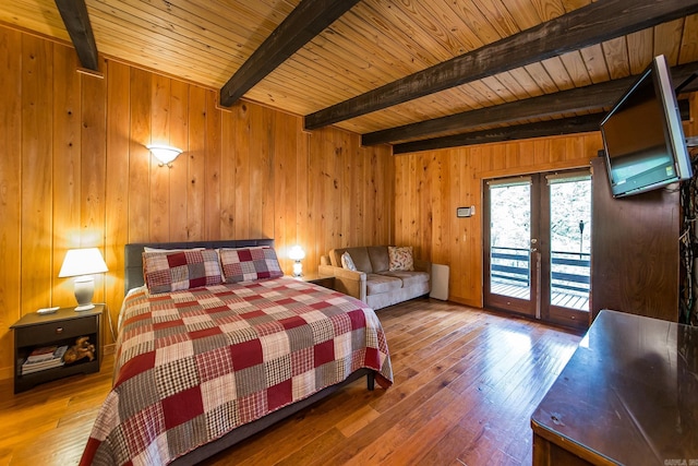 bedroom with french doors, access to outside, hardwood / wood-style flooring, wooden ceiling, and beamed ceiling