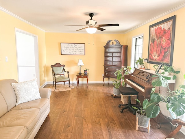 sitting room featuring crown molding, ceiling fan, and wood-type flooring