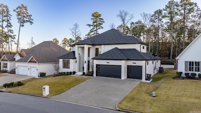 view of front of house with a yard and cooling unit